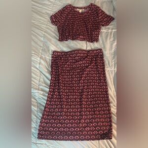 Two Piece Set. Light, dark pink & white design with black base. Skirt, crop top